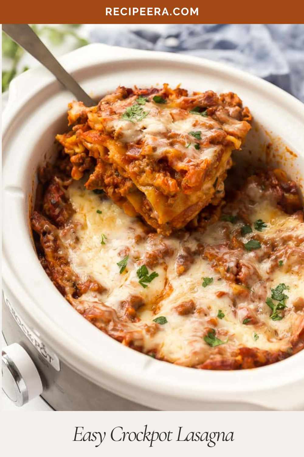 slice of lasagna being lifted out of crockpot